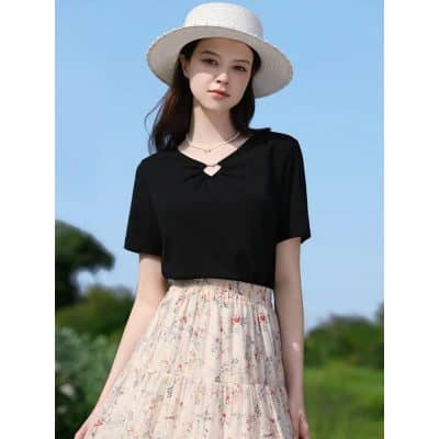 Elegant black women's top with a keyhole neckline perfect for summer fashion and casual wear.