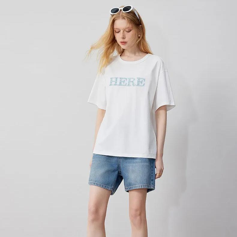 Stylish white casual T-shirt with "HERE" print, perfect for everyday wear and rated for comfort.