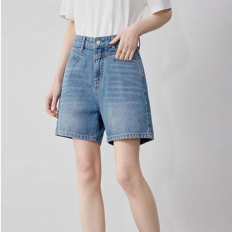 Comfortable women's denim shorts perfect for summer and everyday wear. Stylish, versatile, and lightweight, ideal for pairing with optometry or fashion accessories.