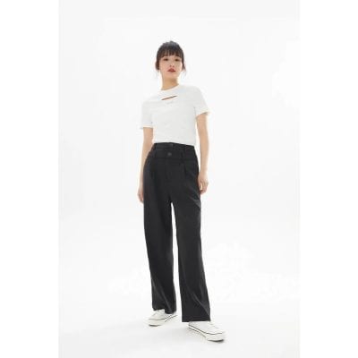 High-waisted black pants for women with a relaxed fit, featuring button details; paired with a trendy white distressed T-shirt, suitable for casual and streetwear styles.