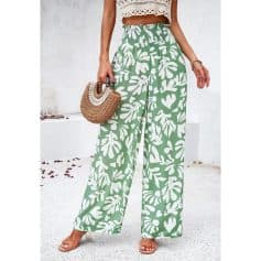 Comfortable women's fashion pants with vibrant tropical print, perfect for summer and casual wear.
