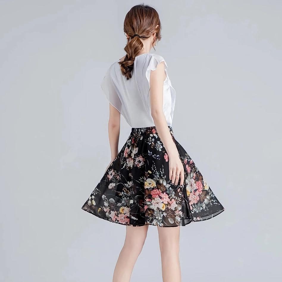 Elegant floral print skirt for women, perfect for casual or semi-formal occasions, embodies feminine style and trendy fashion.
