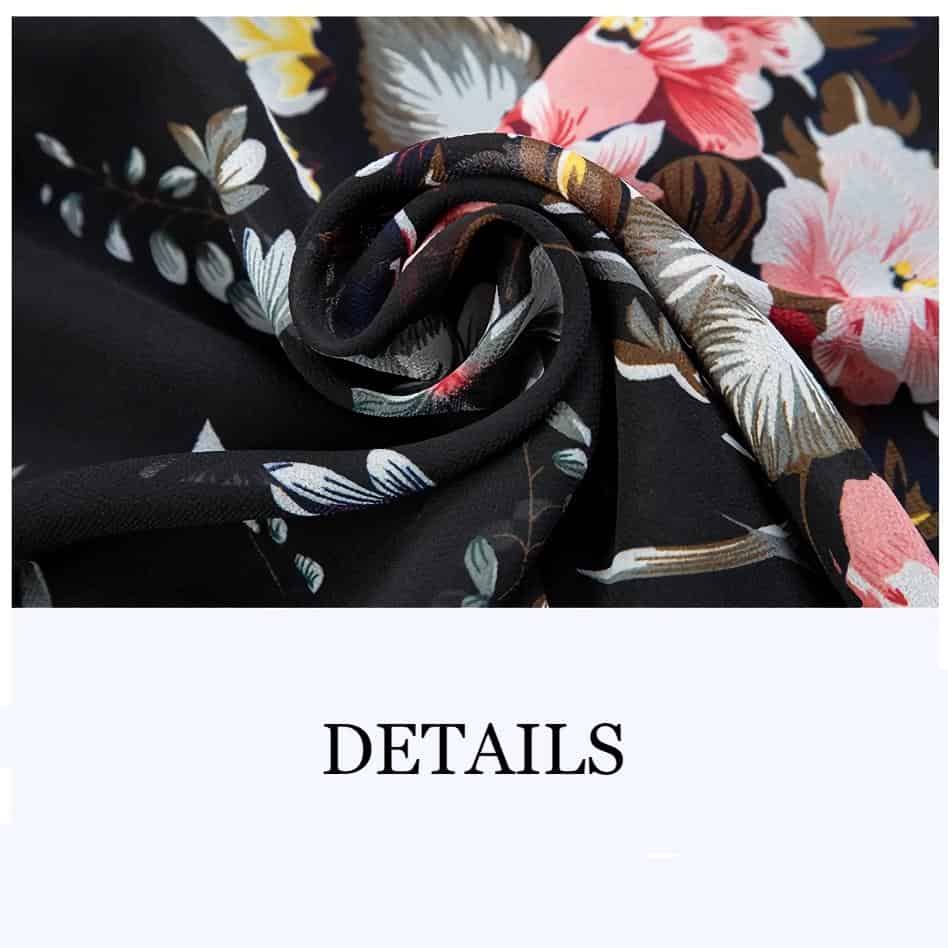 Elegant floral fabric scarf featuring a black background and bright pink, white, and brown floral patterns for trendy accessories.