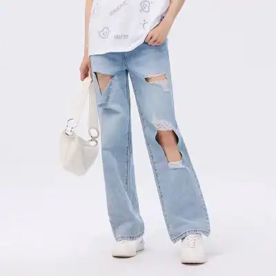 Comfortable trendy ripped denim pants, ideal for casual, streetwear, or fashion-forward statements. Perfect fit for stylish outfits and everyday wear.