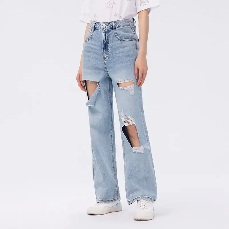 Casual distressed denim with wide-leg fit, high waist, and ripped details, perfect for trendy streetwear and casual everyday outfits.