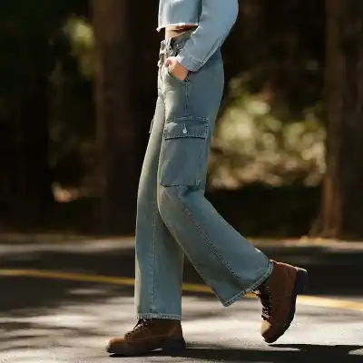 Comfortable stylish distressed denim jeans for women, featuring cargo pockets, perfect for casual outings and outdoor activities.