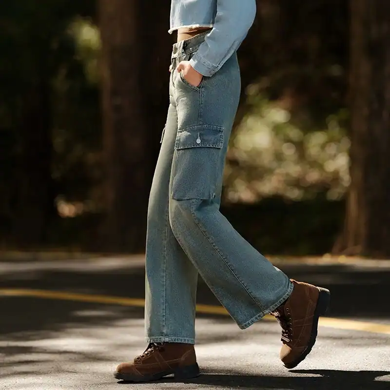 Comfortable stylish distressed denim jeans for women, featuring cargo pockets, perfect for casual outings and outdoor activities.