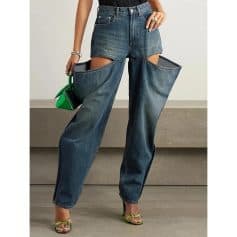 High-fashion woman's jeans with cut-out design for a bold, modern look.