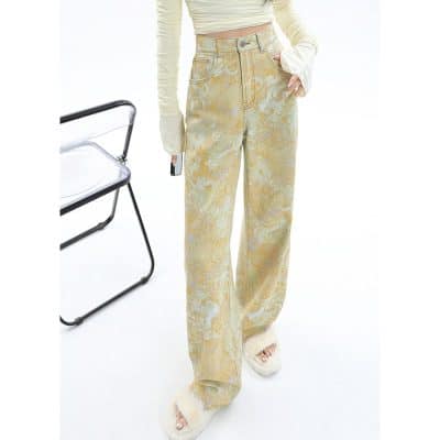 High-quality wide-leg pants with unique gold and cream pattern, perfect for trendy fashion and casual wear. Unique design and comfortable fit for modern style.