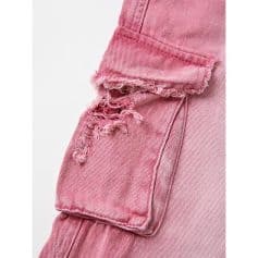 Vibrant pink distressed jeans featuring ripped and frayed pocket details, perfect for fashionable casual outfits. Made with high-quality denim for comfort and style.