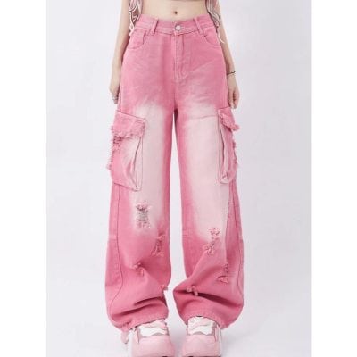 Comfortable pink distressed cargo pants for women with large pockets and frayed details, perfect for casual, trendy fashion.