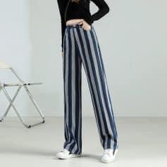 Stylish women's high-waisted wide-leg pants with vertical navy and gray stripes, perfect for casual or fashionable outfits. Made from comfortable fabric, these trendy pants are ideal for modern streetwear.