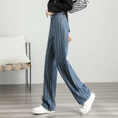 Comfortable striped wide-leg pants for women at Monalisa Store, perfect for casual or trendy outfits. High-quality denim with fashionable vertical stripes and a relaxed fit.