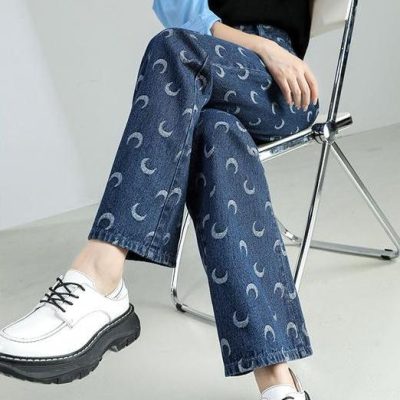 Stylish moon-patterned denim jeans featuring a trendy, relaxed fit perfect for casual wear and fashion-forward looks. Made with high-quality denim for comfort and durability.