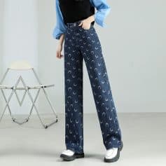Stylish wide-leg denim jeans with moon print, perfect for casual and trendy outfits. Comfortable fit with high waist design, ideal for everyday wear and fashion-forward looks.