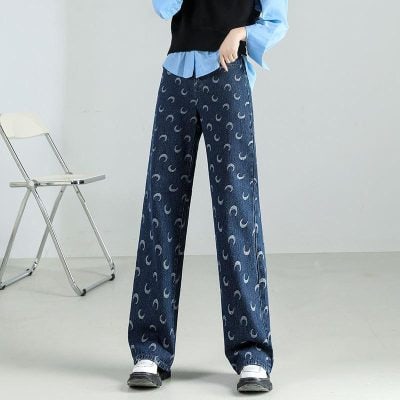 Comfortable wide-leg denim pants with moon print, perfect for everyday fashion and stylish eyewear storage.