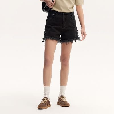 Stylish black distressed denim shorts perfect for everyday wear, combining comfort and trendy design with frayed hems.