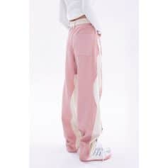 High-quality pink distressed denim pants for trendy outfits. Perfect for casual wear, featuring a loose fit and unique design elements from Monalisa Store.