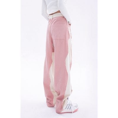 High-quality pink distressed denim pants for trendy outfits. Perfect for casual wear, featuring a loose fit and unique design elements from Monalisa Store.