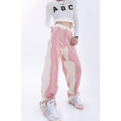 Fashionable pink and cream patchwork wide-leg pants for a trendy casual look. Perfect for streetwear, girls' fashion, and everyday wear with comfortable fit.