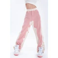 Stylish relaxed fit pink and white distressed casual pants ideal for trendy streetwear and comfortable everyday style, perfect for fashion-forward individuals.