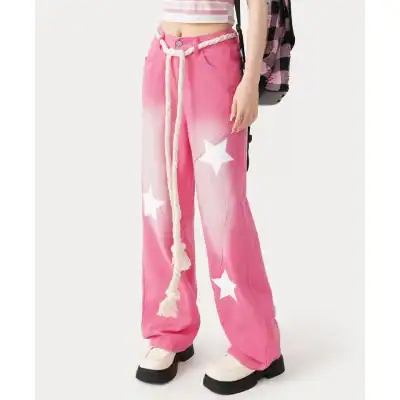 Fashionable pink wide-leg jeans with white star prints, trendy streetwear style for women.