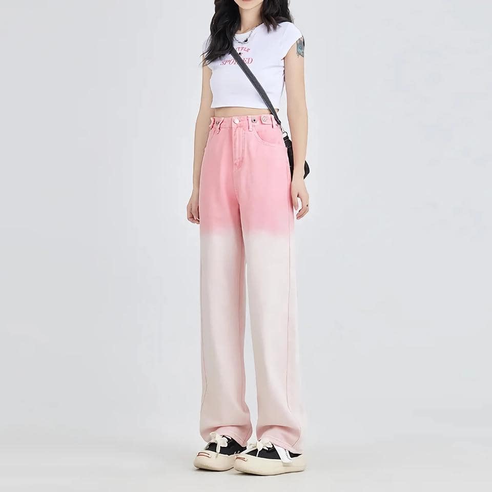 A young woman modeling trendy pink and white gradient wide-leg pants for modern fashion and casual wear. Perfect for stylish outings, emphasizing comfort and stylish appeal.