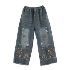 Casual denim pants featuring intricate embroidery, distressed details, and wide-leg fit, perfect for trendy, comfortable everyday wear. Great option for stylish and relaxed fashion.