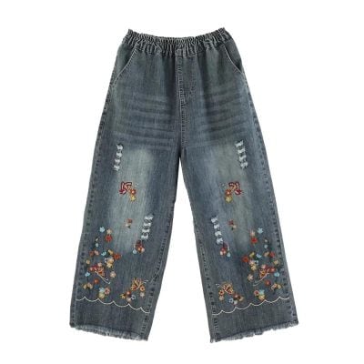 Casual denim pants featuring intricate embroidery, distressed details, and wide-leg fit, perfect for trendy, comfortable everyday wear. Great option for stylish and relaxed fashion.