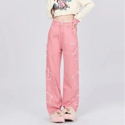 Stylish pink high-waisted distressed jeans with fun dog prints, perfect for casual wear and daytime outings. Made from comfortable denim material with trendy design details.