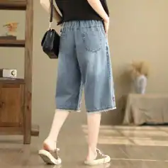 Comfortable, stylish women's denim shorts in a relaxed fit with trendy distressing for a casual look.