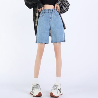 Stylish women's denim shorts perfect for casual wear, featuring a high waist, frayed edges, and a trendy fit, ideal for summer outfits and everyday fashion.