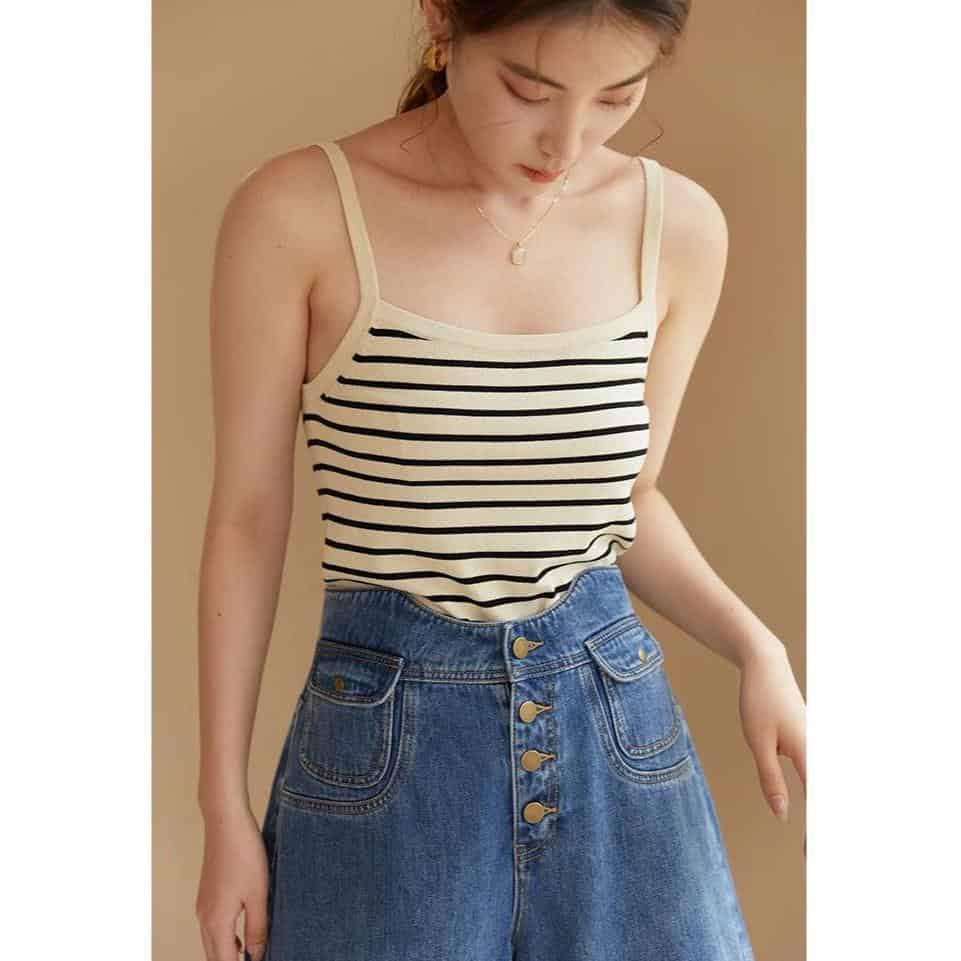 Comfortable striped sleeveless top for women, perfect for summer fashion, paired with high-waisted jeans from Monalisa Store.