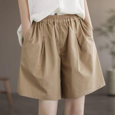 Comfortable beige women's casual shorts with elastic waistband, perfect for summer, travel, and everyday wear. Stylish and breathable, ideal for a fashionable yet comfortable look.