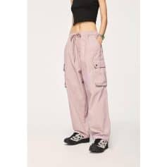 Versatile pink cargo pants with multiple pockets, drawstring waist, perfect for casual and streetwear styles, available at Monalisa Store.