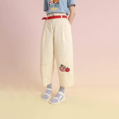 Bright yellow wide-leg pants featuring cute embroidered apple and strawberry patches, perfect for casual, trendy styles and comfortable wear.