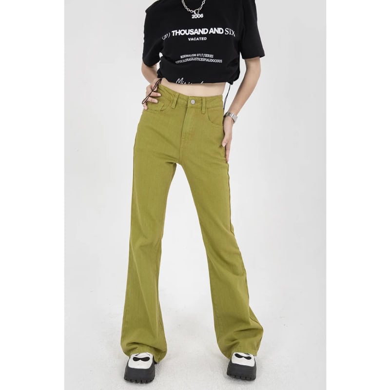 Comfortable yellow high-rise casual pants for women with classic pockets and belt loops. Perfect for everyday wear or fashion-forward outfits.