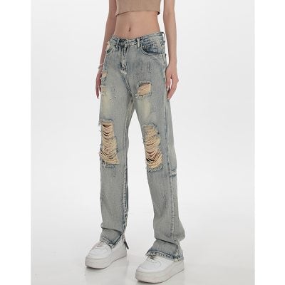 Comfortable distressed ripped jeans for women, stylish and trendy casual wear. Perfect for street fashion, streetwear, and everyday use.