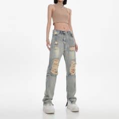 Distressed denim jeans, ripped jeans, women's fashion, trendy distressed jeans, casual wear, stylish ripped denim, high-rise jeans, street style, comfortable women's jeans.