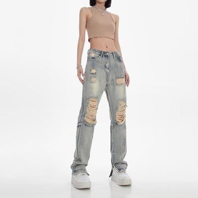 Distressed denim jeans, ripped jeans, women's fashion, trendy distressed jeans, casual wear, stylish ripped denim, high-rise jeans, street style, comfortable women's jeans.