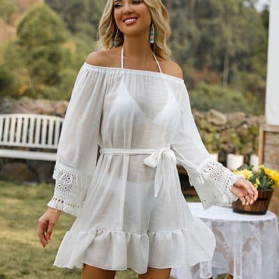 Lightweight white summer dress with off-shoulder design, lace sleeve accents, and ruffle hem, ideal for warm weather, beach days, and casual outings. Stylish, comfortable, and versatile.