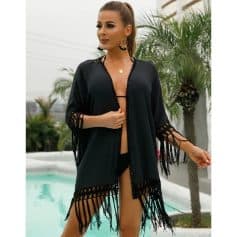 Elegant black beach cover-up with lace and fringe details, perfect for poolside or seaside walks, enhancing your poolside or vacation look with style and comfort.