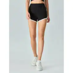 Comfortable women’s athletic shorts, ideal for running, gym, or casual wear, featuring lightweight, breathable fabric and stylish design for active lifestyles.