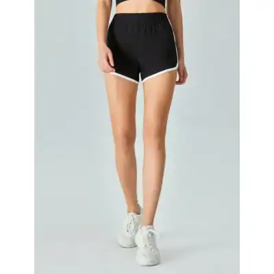 Comfortable women’s athletic shorts, ideal for running, gym, or casual wear, featuring lightweight, breathable fabric and stylish design for active lifestyles.