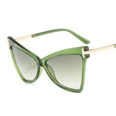 Stylish green sunglasses with tinted lenses, perfect for UV protection and fashion accessories, available at Monalisa Medical Store for trendy eyewear.