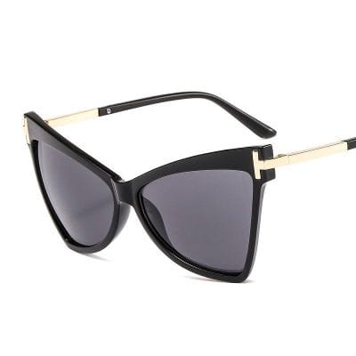 Elegant black designer sunglasses with gold accents, perfect for fashion-forward eyewear lovers. UV protection lenses for stylish sun protection.