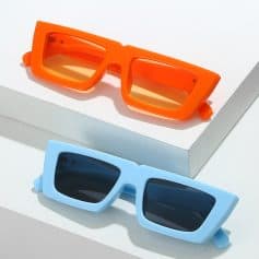 Colorful 3D sunglasses in orange and blue for fashion and sun protection at Monalisa Store. Trendy accessories for a bold, stylish look.