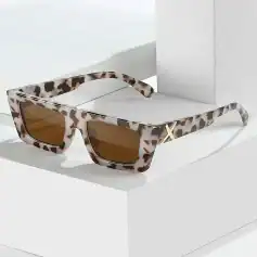 Stylish tortoise print sunglasses with brown tinted lenses, perfect for fashion and eye protection. Featured on Monalisa Medical's online store for trendy eyewear options.