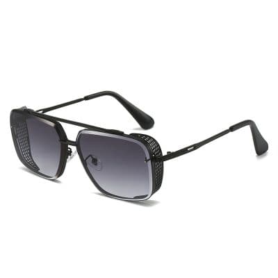 Stylish black sunglasses with gradient lenses and modern design, perfect for UV protection and fashion.