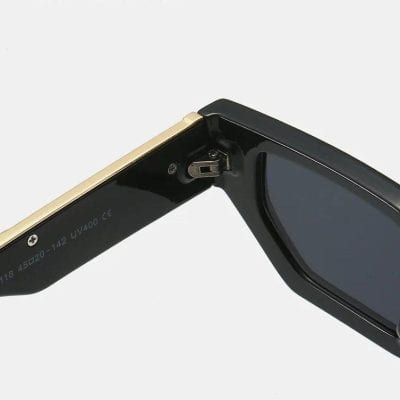 High-quality black sunglasses with UV protection, stylish design, and durable frame for outdoor wear. Perfect for sun protection and fashionable accessorizing.